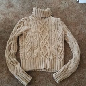 Tan turtleneck sweater
